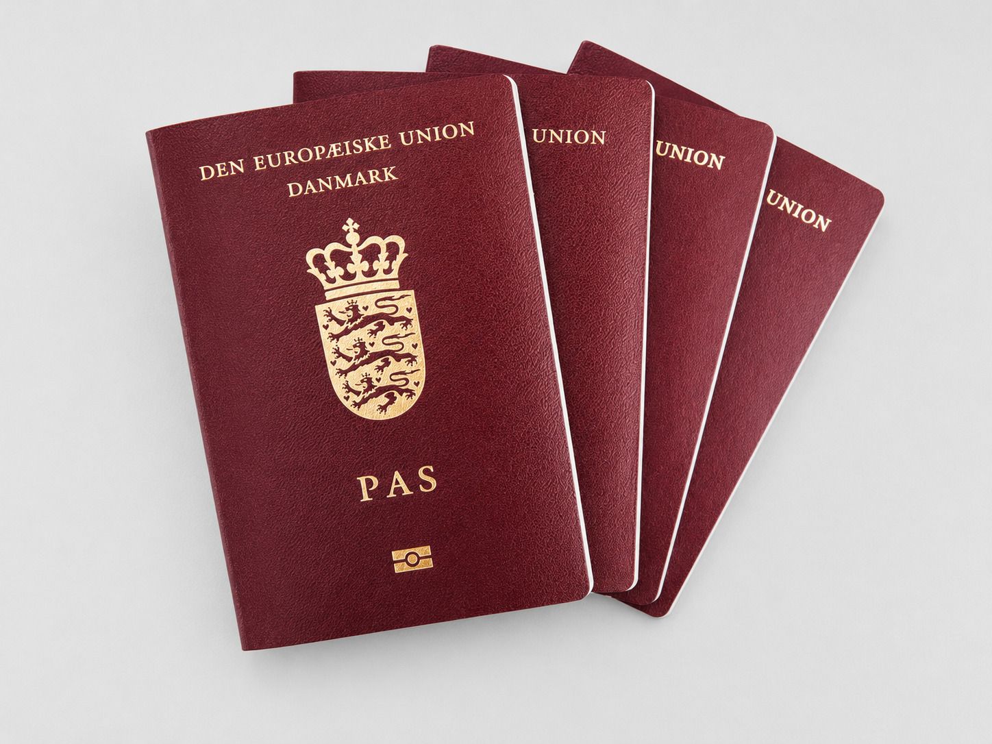 Denmark Passports On Top Of Each Other
