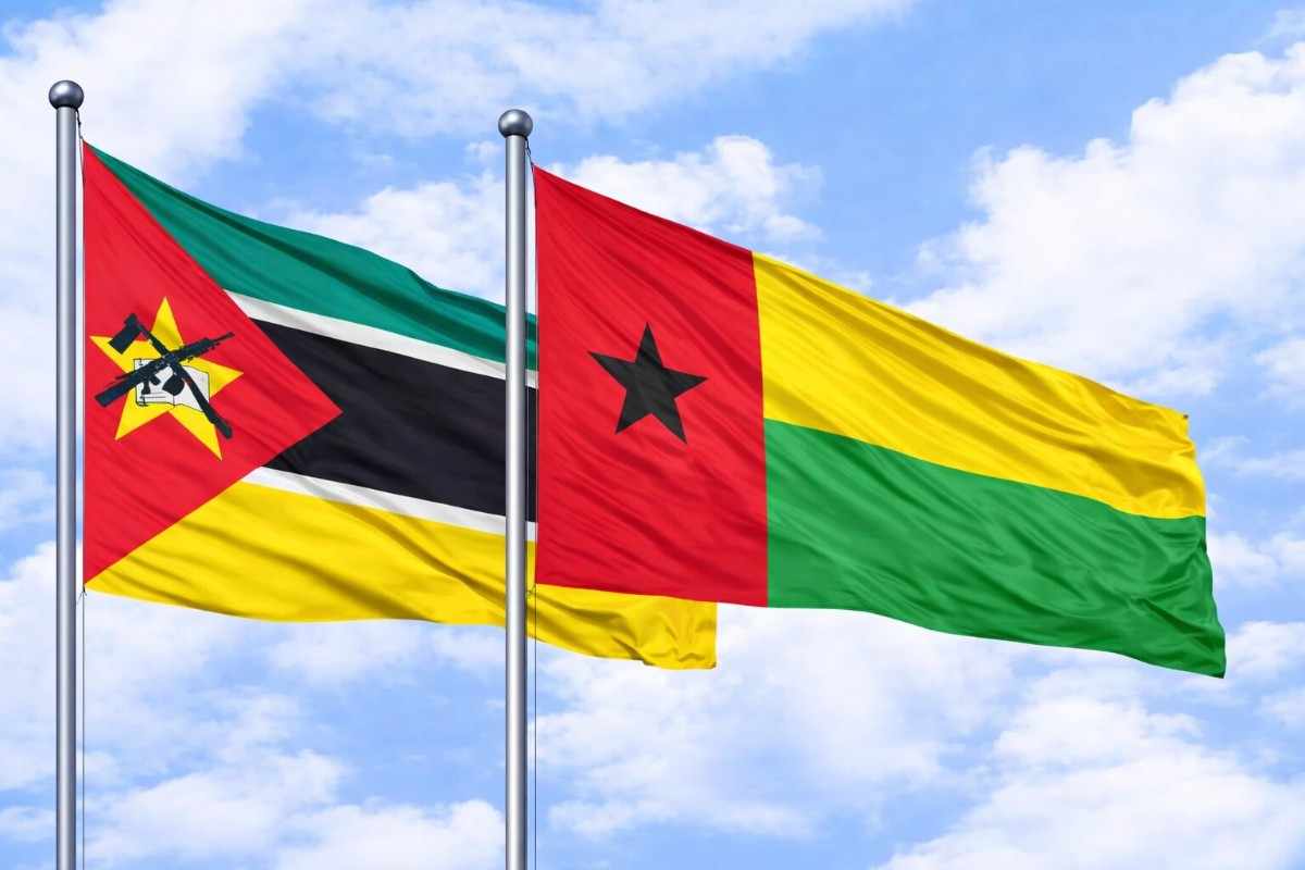 Flags Of Mozambique And Guinea Bissau Flying