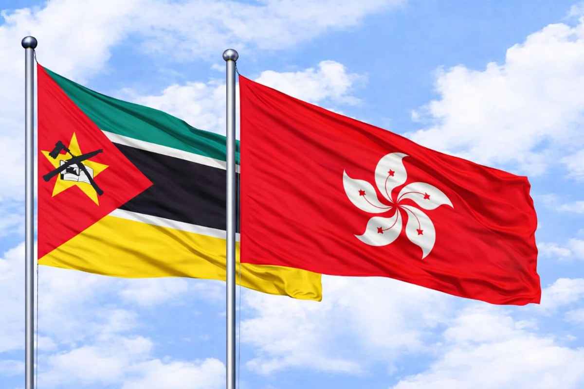 Flags Of Mozambique And Hong Kong Flying Together