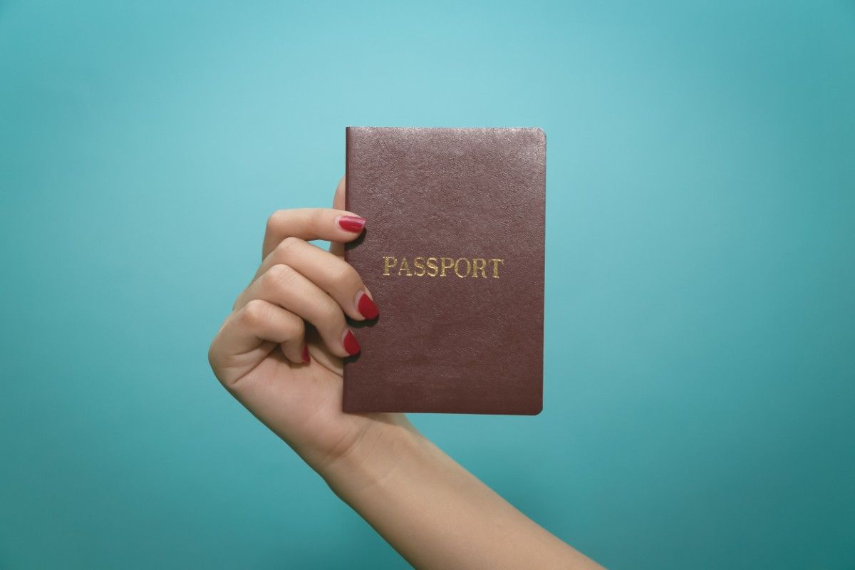 Passport On Blue Background