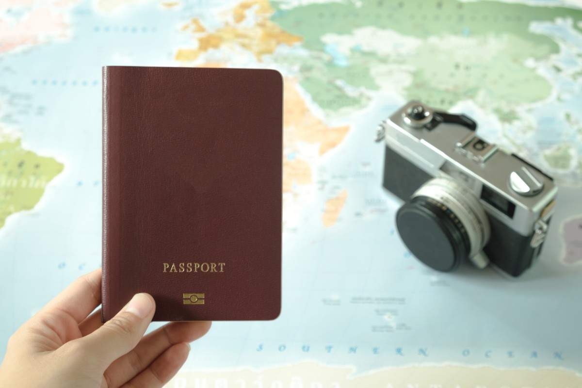 Passport With Retro Camera