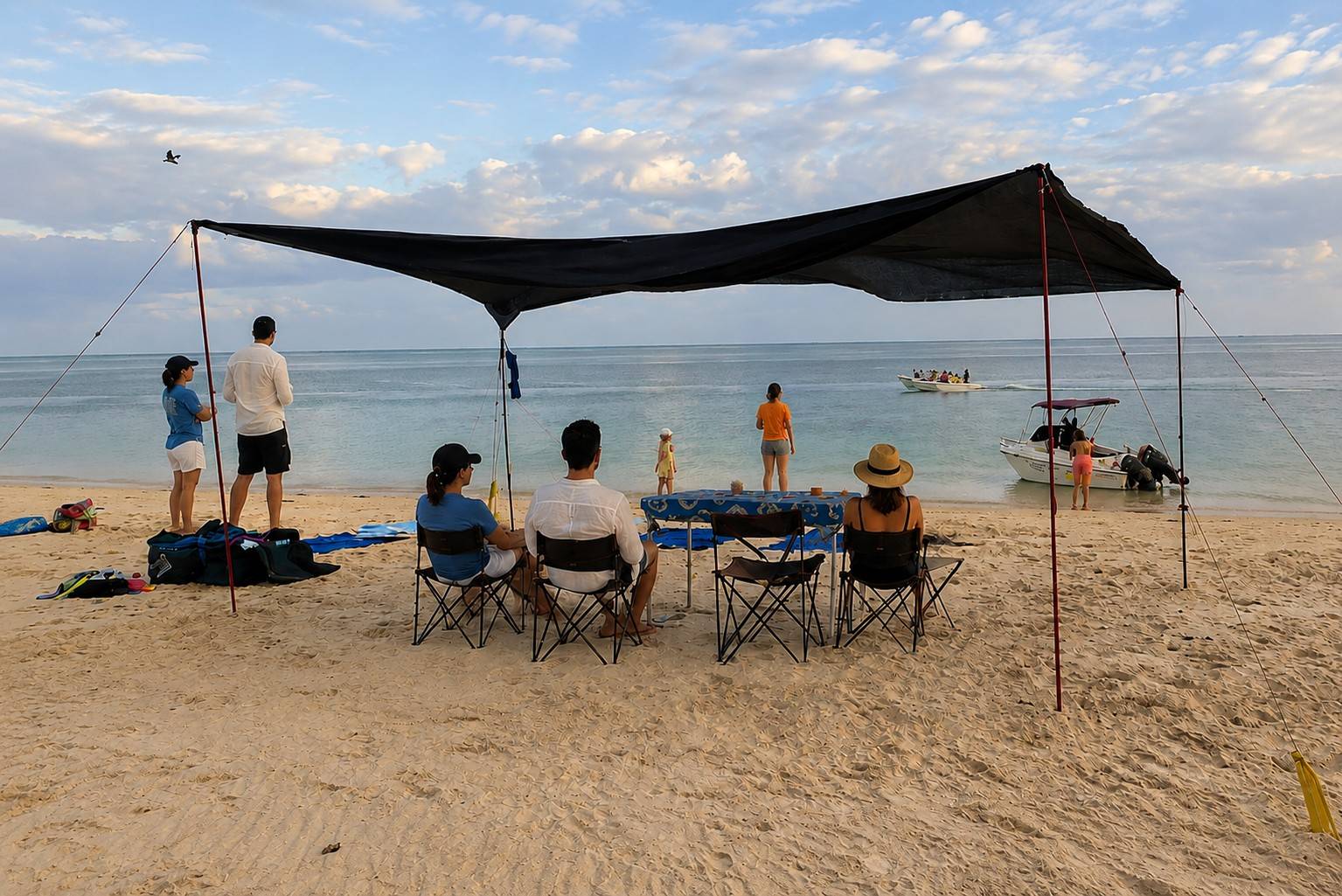 Tourists Relaxing On Magaruque Island
