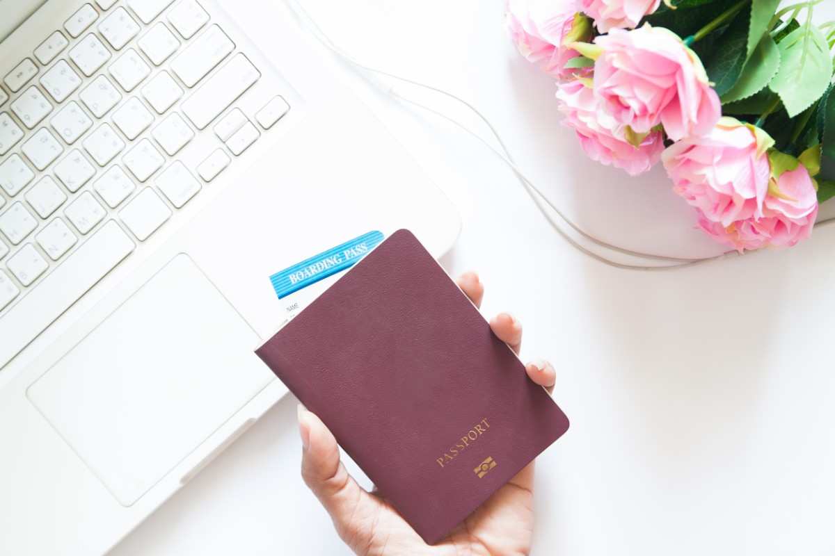 Woman Hand Holding Passport